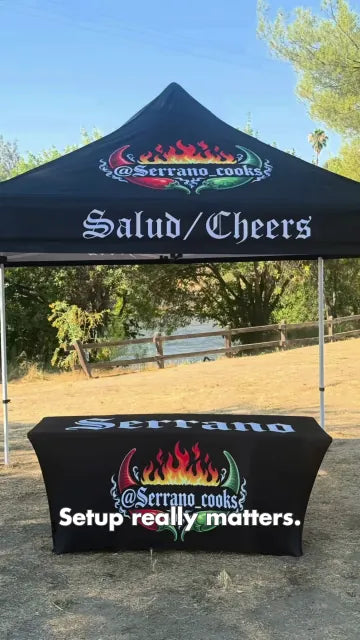 Serrano Cooks canopy tent with a matching printed table cover